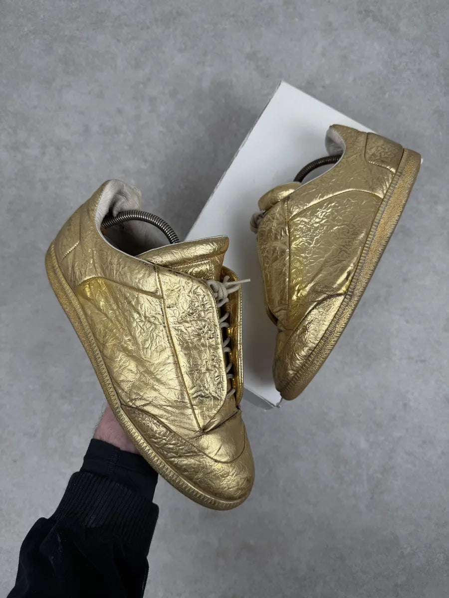 gold dress sneakers Stella Sneaker In Gold Metallic Leather - Sneakers main image 0