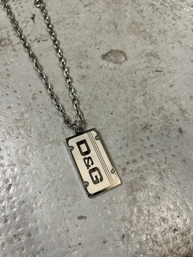 2000s Dolce & Gabbana Propaganda Dog Tag Necklace – Dolce Vita Hub 2000s Dolce & Gabbana Propaganda Dog Tag Necklace – Dolce Vita Hub