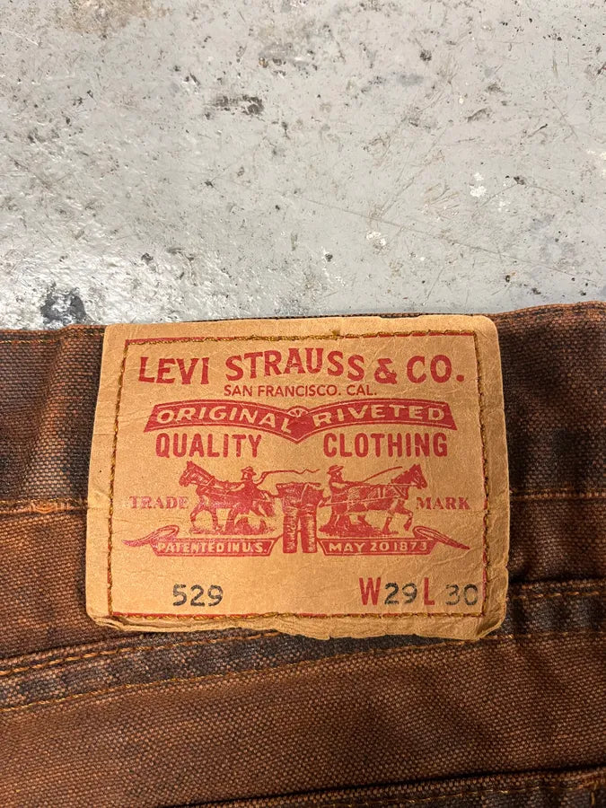 2000s Levi’s 529 Faded Orange Denim Jeans (S/M) 10