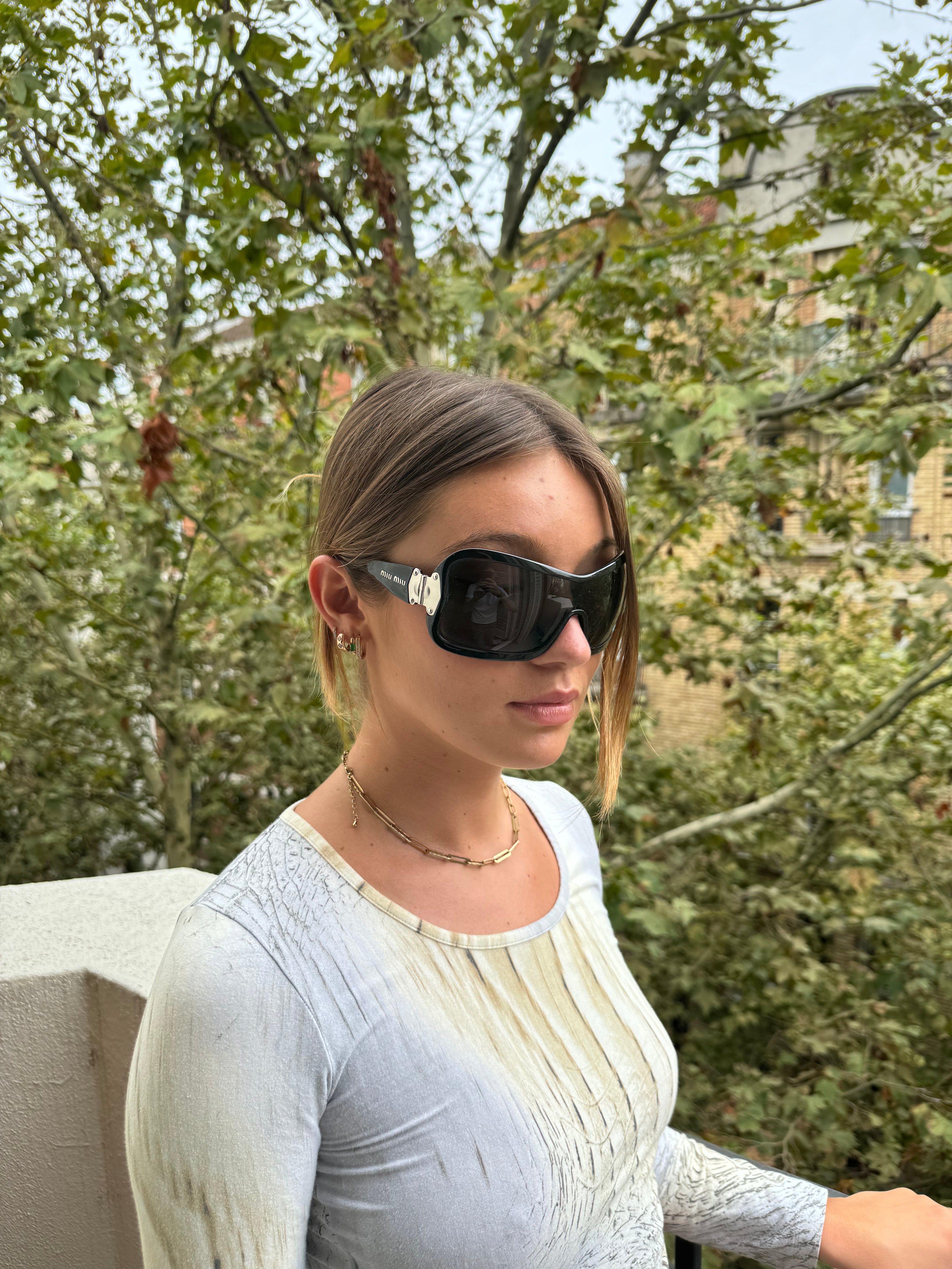 MiuMiu Black Silver Frame Avant-Garde Sunglasses