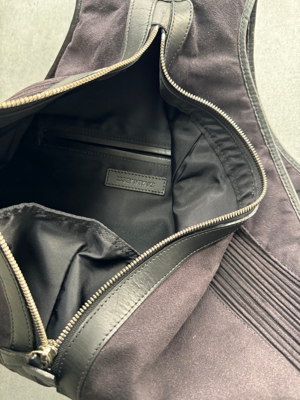 Issey Miyake Triangle Leather Backpack (OS)