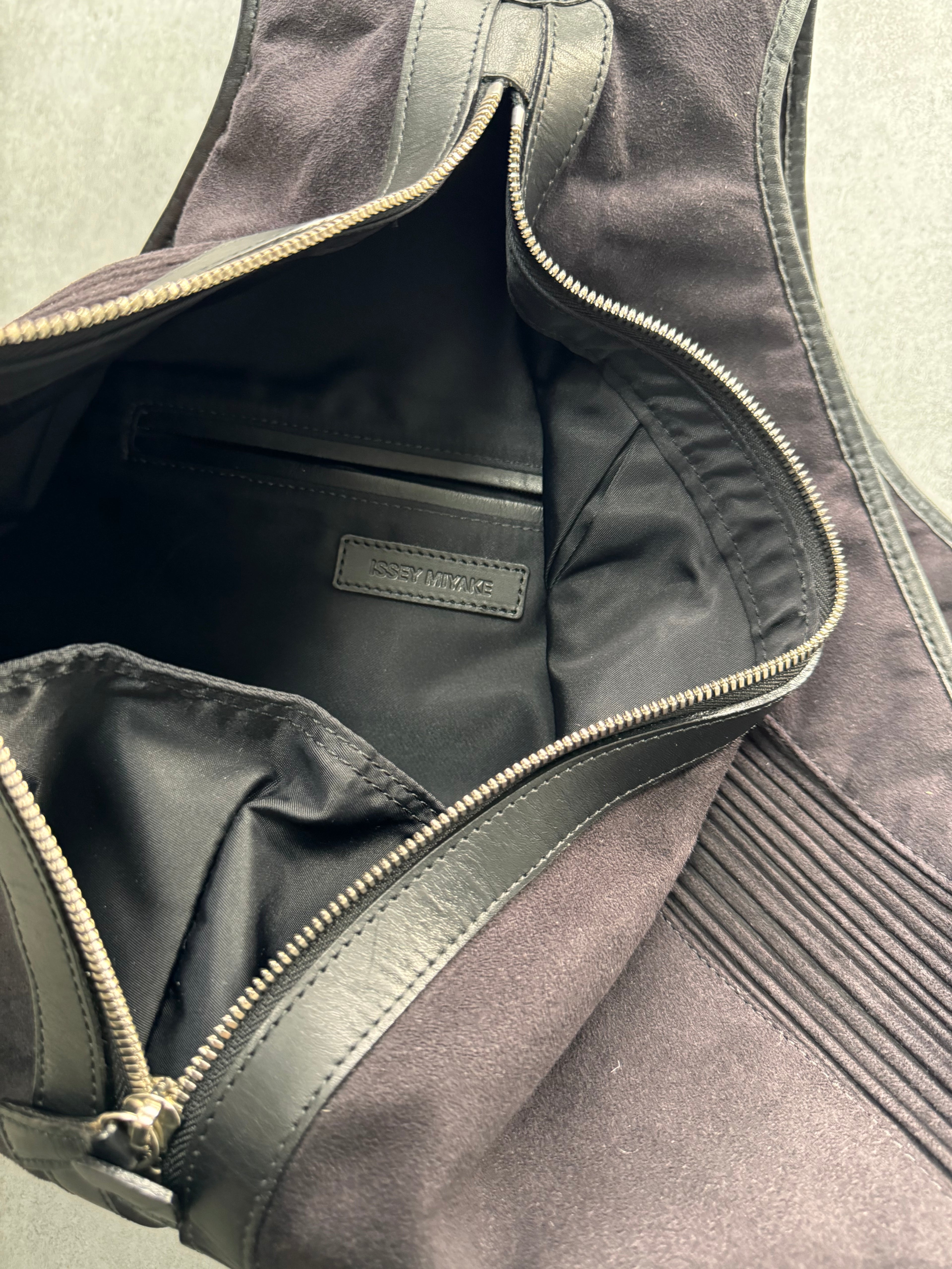 Issey Miyake Triangle Leather Backpack (OS)