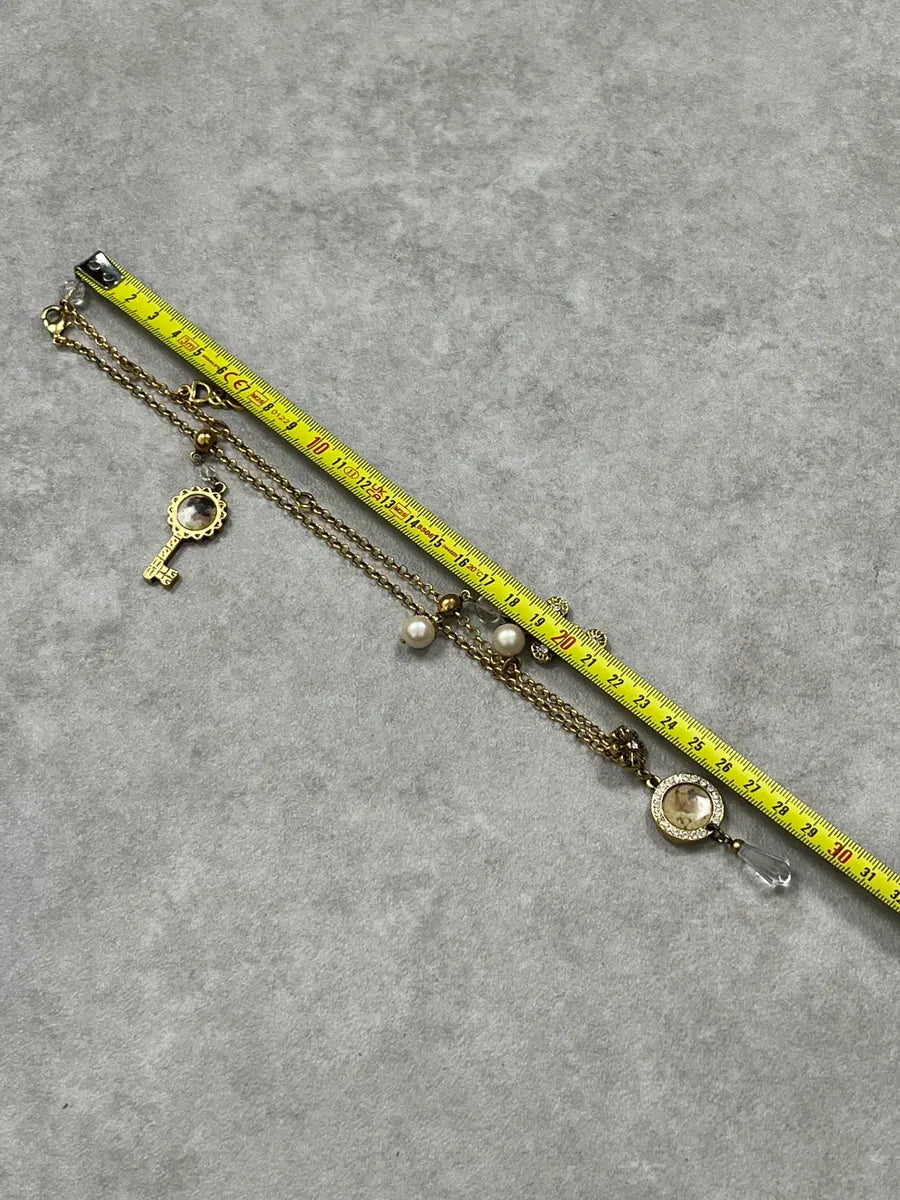 Dolce & Gabbana Multi Pendant Ornament Necklace DbfwpiL 6